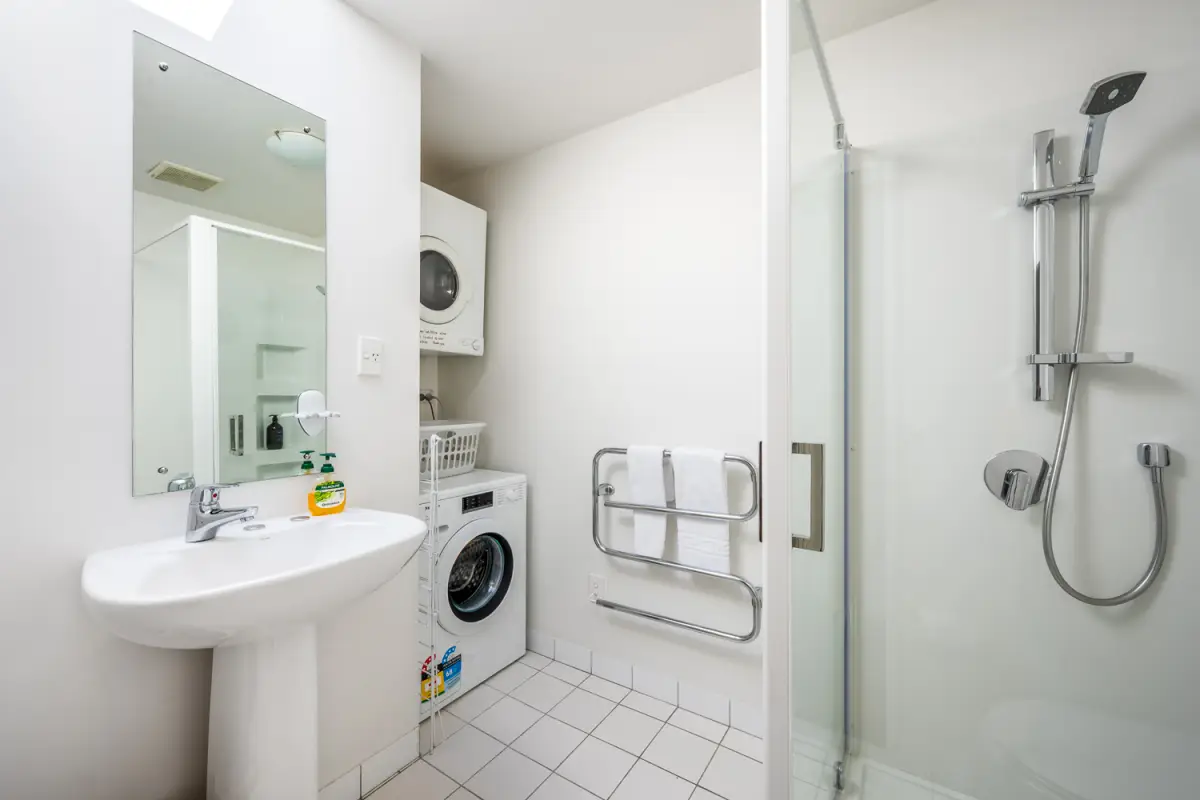 Laundry & Bathroom with Glass Shower