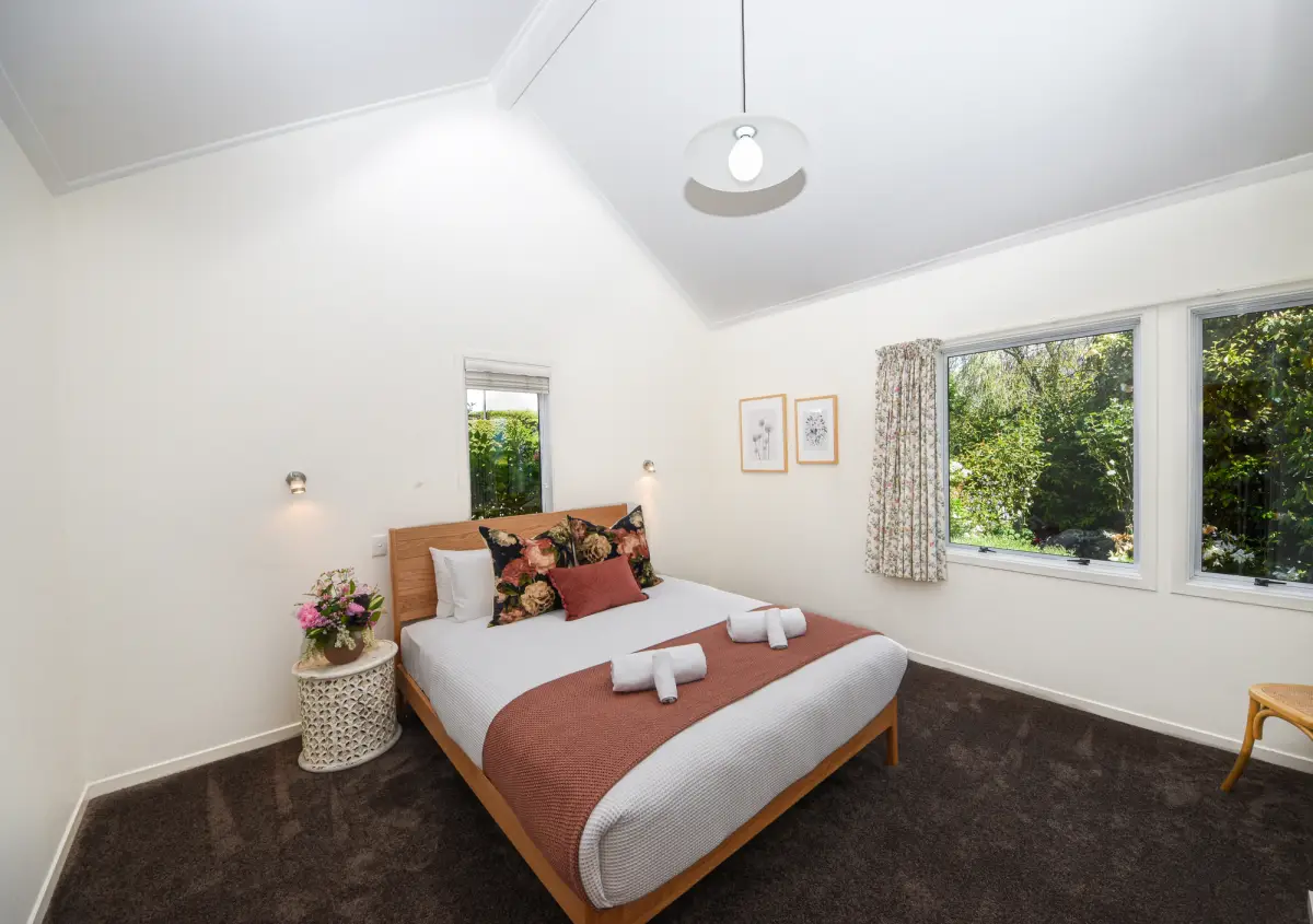 Guest Bedroom with Large Windows 