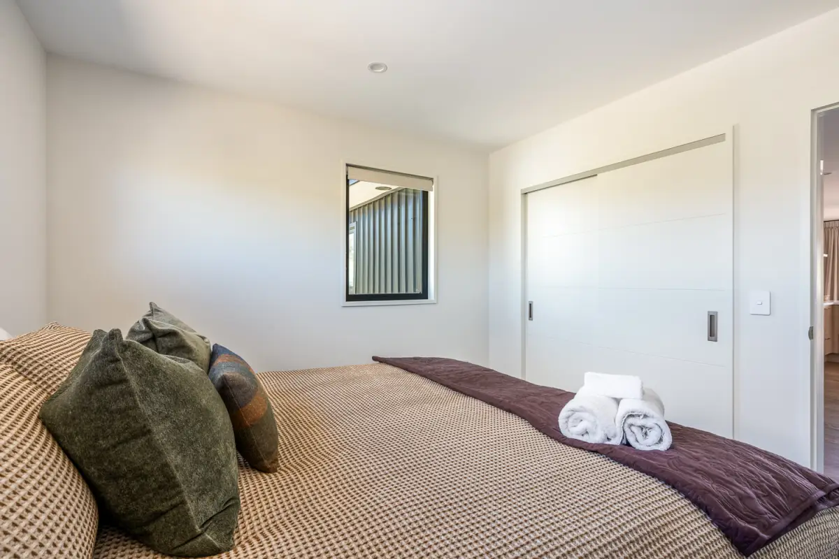Cozy Guest Room with Built-In Wardrobe 