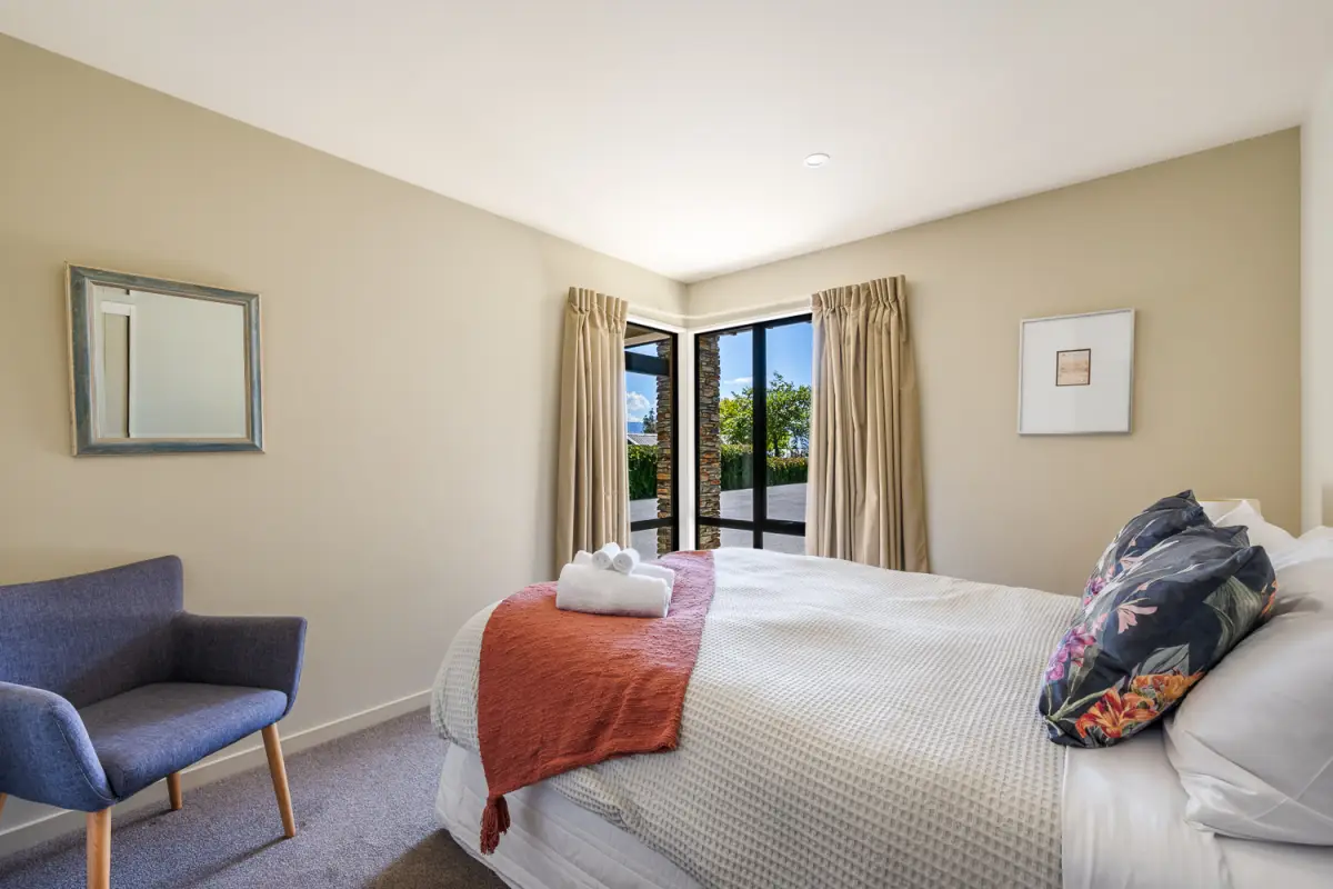 comfortable bedroom with lovely styling 